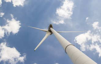 a wind turbine viewed from its base