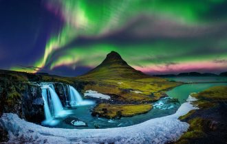 Northern,Light,,Aurora,Borealis,At,Kirkjufell,In,Iceland.,Kirkjufell,Mountains