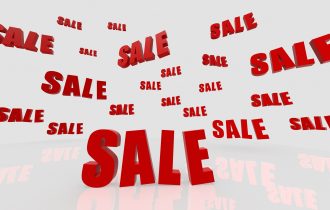 red sale signs in the sky