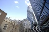 view of the Gherkin flanked by St Helen's church and modern office building Modern,Office,Buildings,In,London