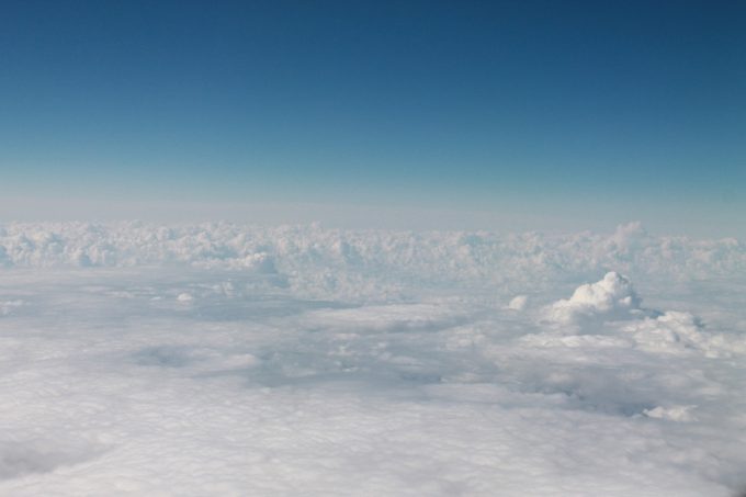 blue sky above a cloud layer