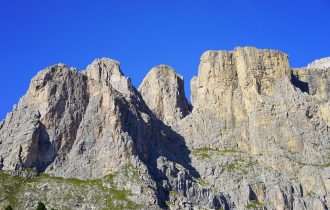 mountainous and rocky landscape against blue sky
