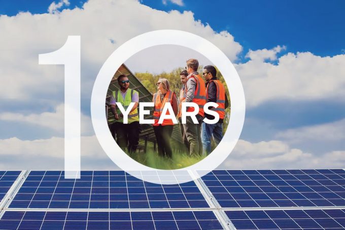 solar panels in the sun with the text '10 years' superimposed and a picture of a site visit to a solar farm inside the zero