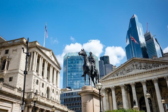 view of bank of england and royal exchange with statue of wellington in foreground