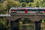 an abellio train crossing a river in Germany