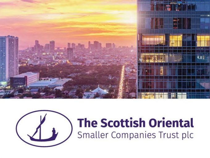 a view of dawn across an asian city underneath which is the scottish oriental smaller companies logo