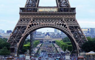 view through the Eiffel Tower towards the Trocadero