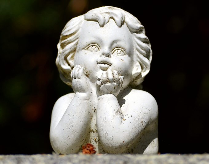 image of a stone cupid