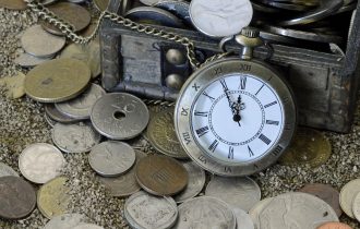 Pocket watch with coins