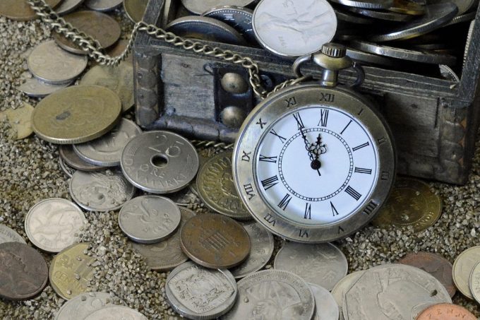 Pocket watch with coins