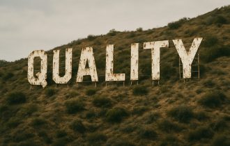 the word quality, looking like the hollywod sign, but faded