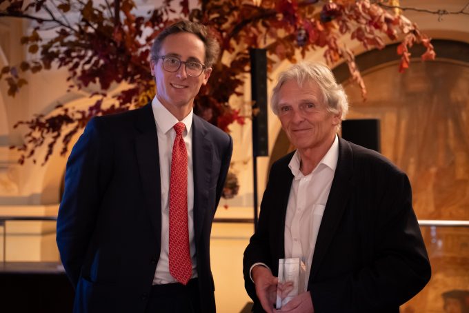 QuotedData chief executive Edward Marten (left) stands with Person of the Year (2025) award winner Peter Hewitt.
