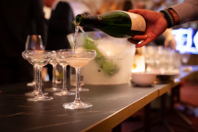 Champagne being poured at the QuotedData's Investor Choice Awards 2025
