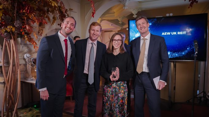 AEW UK REIT real estate fund controller George Elliot, assistant portfolio manager Henry Butt and portfolio manager Laura Elkin collect the Best for Property award from QuotedData in 2025.