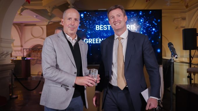 John Musk (left), head of listed investor relations at Schroder Greencoat, receives QuotedData's Best Board award on behalf of Greencoat UK Wind.