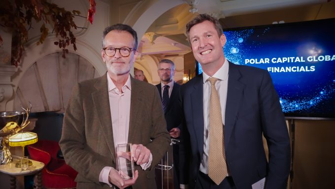Polar Capital Global Financials Trust chair Simon Cordery (left) holds the QuotedData Best Specialist Equity 2025 award.