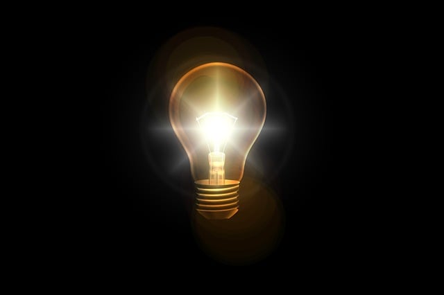 A bright light bulb symbolises a solution to a problem.