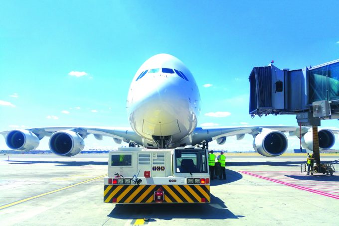 tcr equipment sits in front of a plane