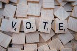 wooden blocks spell out vote