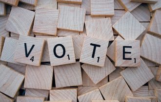 wooden blocks spell out vote