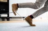 a person trips over a cable