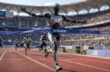 a humanoid robot crosses a finish line - breaking a tape marked winner - in a race with other humanoid robots, in a realistic looking stadium